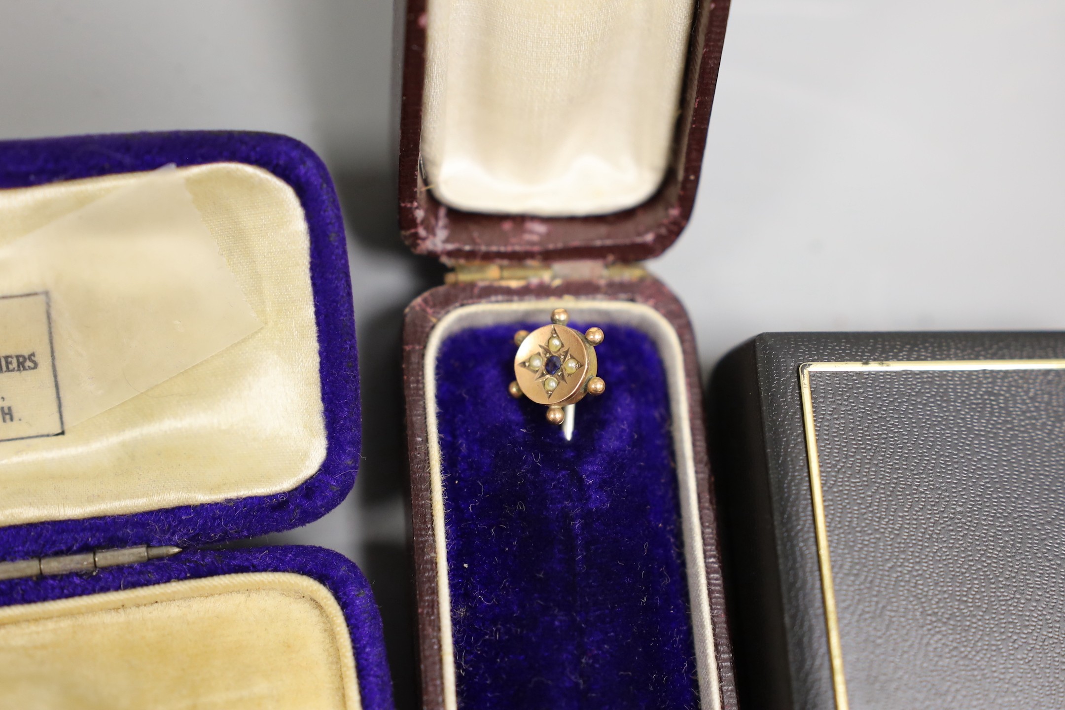 Minor jewellery including a marcasite set peacock brooch, a yellow metal and three stone white opal set stick pin, etc.